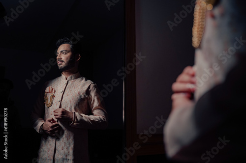 An Indian man in a traditional kurta pajama