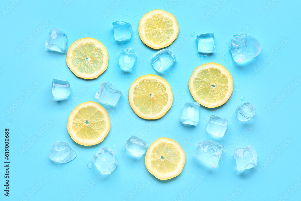 Lime slices with ice cubes on blue background