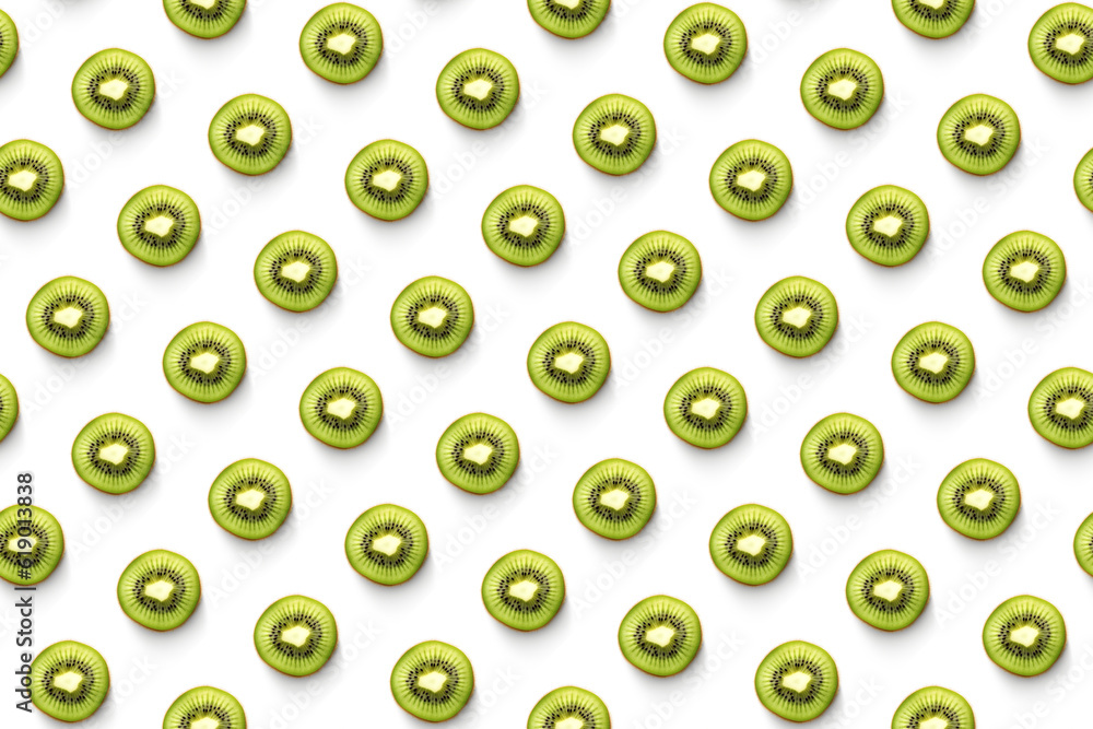 Kiwi fruit slices in diagonal rows isolated seamless pattern on white background, top view Kiwi fruit slices in diagonal rows isolated seamless pattern on white background, top view