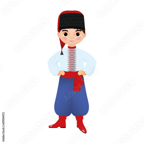 Ukrainian Cossack boy in an embroidered shirt, blue trousers, a hat and red boots