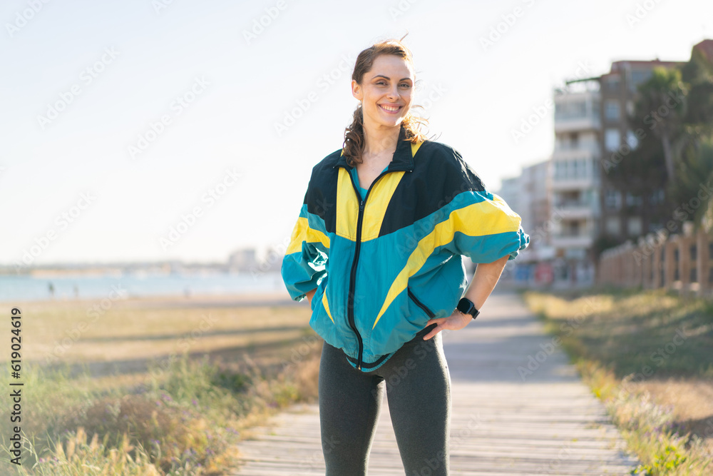 Young woman at outdoors wearing sport wear