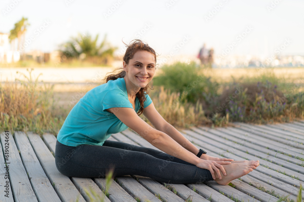 Young woman at outdoors doing yoga
