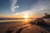 Tent camping on the beach at sunrise
