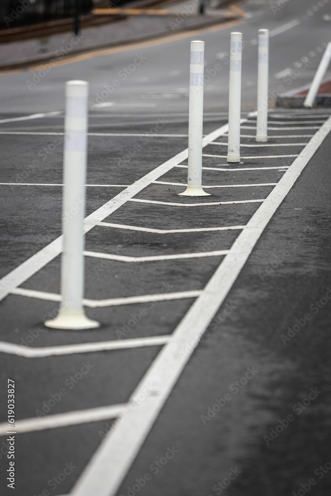 Roadway markers between the street and bike path. Roadway markers between the street and bike path.