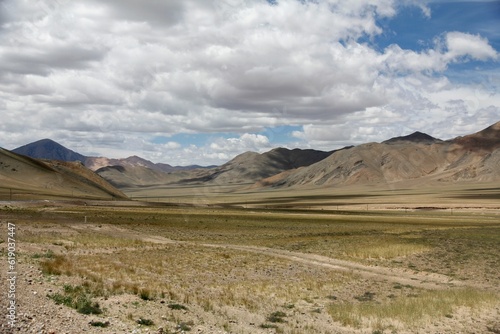 Aerial view of desert surrounded by mountains