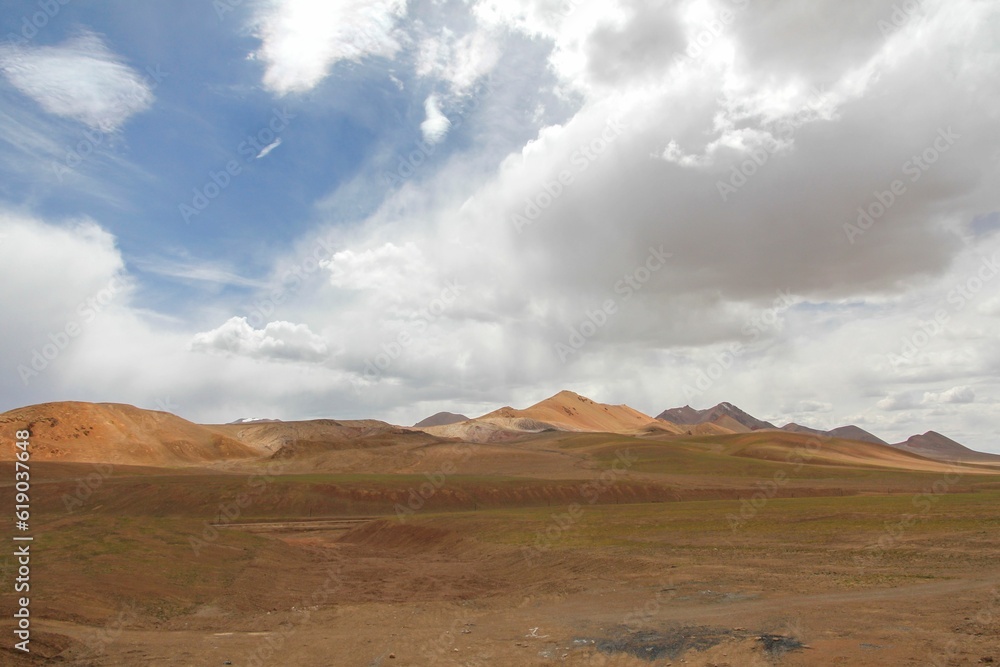 Aerial view of desert surrounded by mountains Aerial view of desert surrounded by mountains