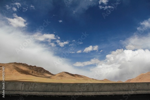 Aerial view of desert surrounded by mountains