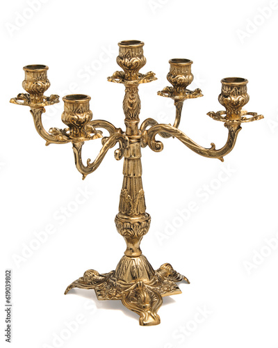 Vintage brass candelabrum for five candles isolated on a white background (without candles)