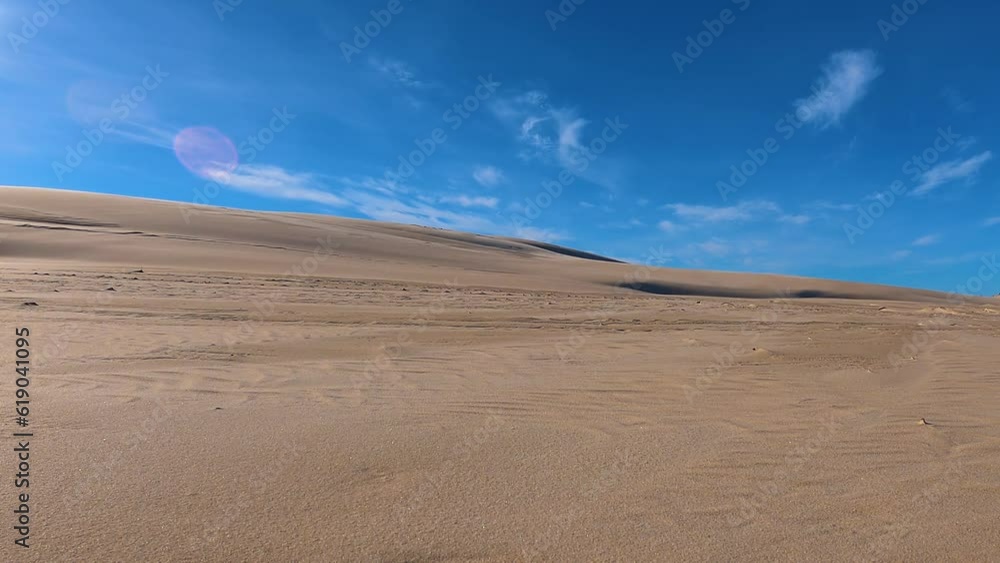 Moving dunes in the desert in Slowinski National Park in Leba, Poland. Time lapse Moving dunes in the desert in Slowinski National Park in Leba, Poland. Time lapse