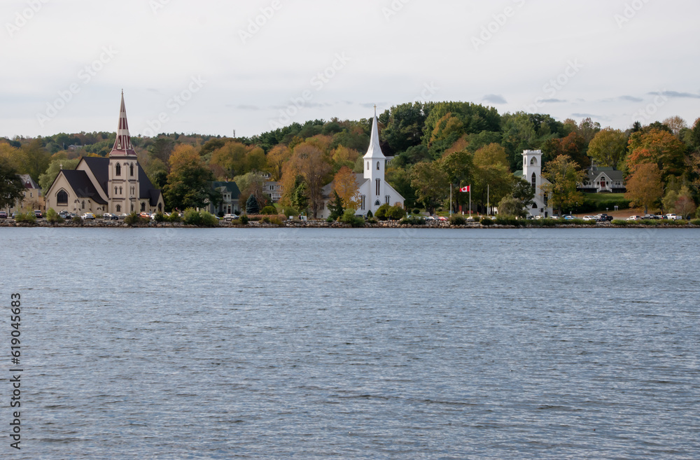 Obraz premium The famous three churches of Mahone Bay near to Lunenburg. Taken in Mahone Bay, Canada, 10.2022.