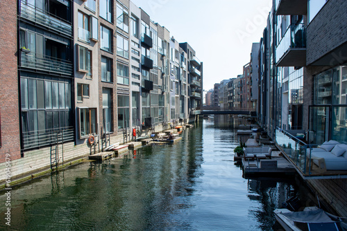 Modern housing estate in Copenhagen, Denmark. A new district Sluseholmen with beautiful eco-friendly buildings at the channel