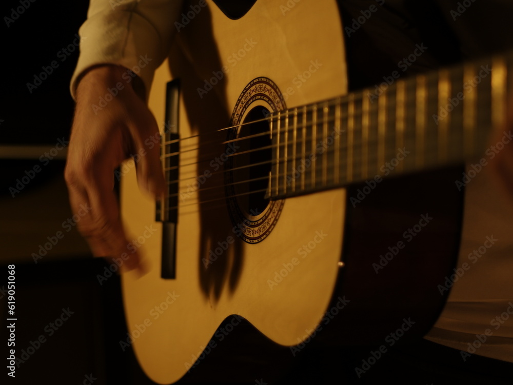 Fototapeta premium Playing Classic Guitar, Flamenco Style, Dark Concept, Elegance