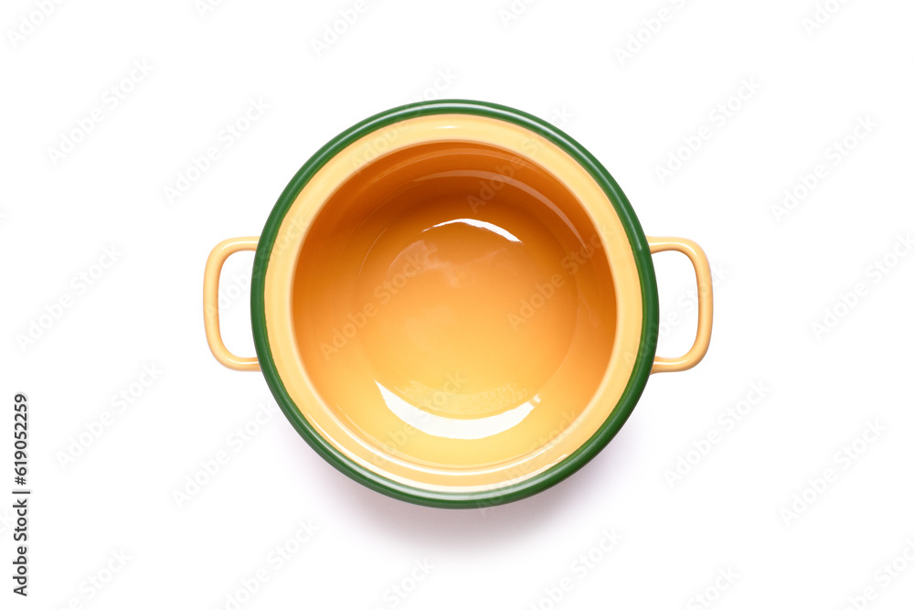 Yellow ceramic cooking pot or saucepan isolated on white background with clipping path, top view, flat lay. - obrazy, fototapety, plakaty 