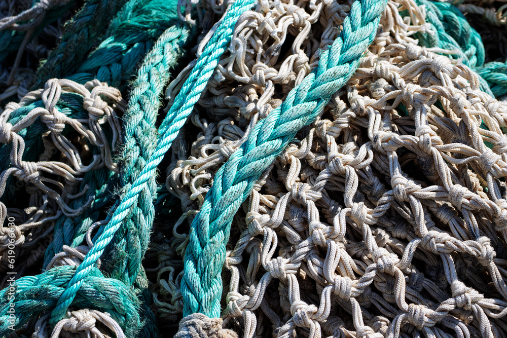 green trawl ropes and white nets 
