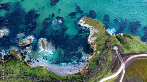 Aerial view of the coastal headland, Whiterocks at the Maghera Cross Viewpoint in Northern Ireland, situated on the Dunluce Road, Bushmills, County Antrim. photo