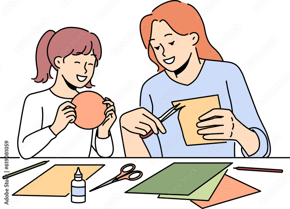 Smiling mother and daughter enjoy arts and crafts Smiling mother and daughter enjoy arts and crafts