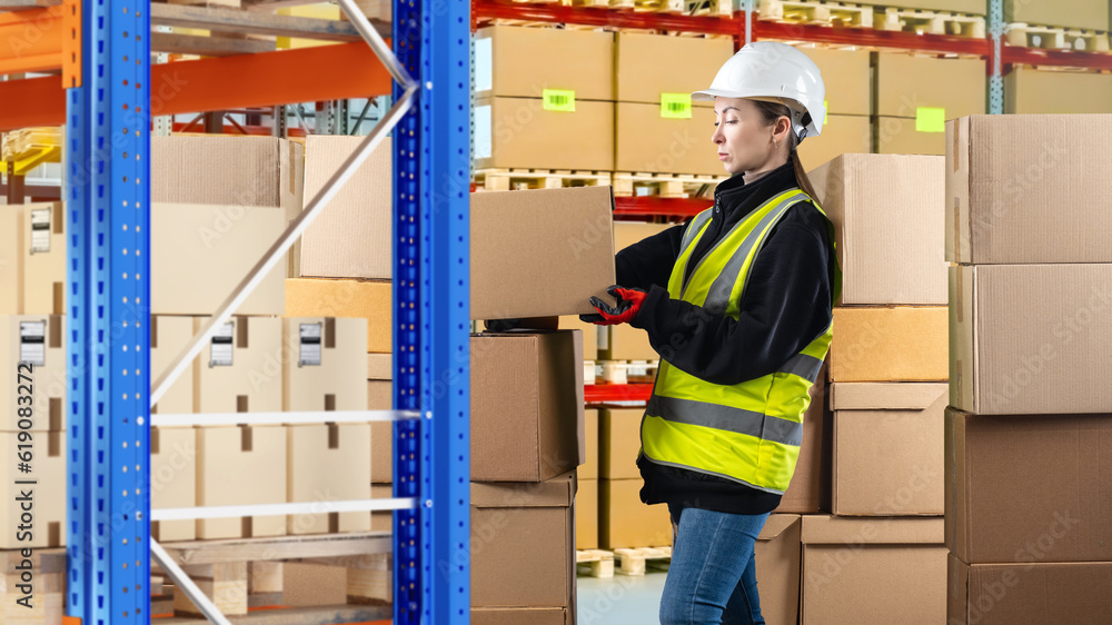 Warehouse supervisor woman. Storekeeper takes box from shelf. Girl in uniform of warehouse worker. Warehouse supervisor. Woman stands among cardboard boxes. Storage company supervisor Warehouse supervisor woman. Storekeeper takes box from shelf. Girl in uniform of warehouse worker. Warehouse supervisor. Woman stands among cardboard boxes. Storage company supervisor