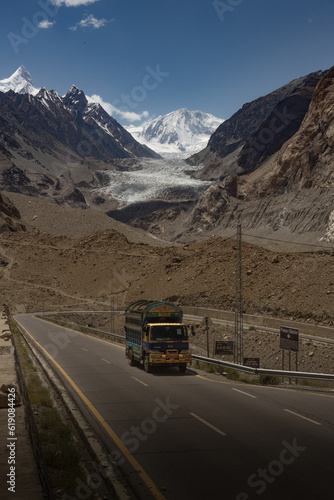 Passu glacier and karakoram highway the 8th wonder of world. One truck is running on the Karakoram highway near Passu Village. This highway connects Pakistan and china for trade and tourism purpose.
