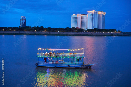 Tourist boats on the Mekong river in the evening in Phnom Penh, Cambodia