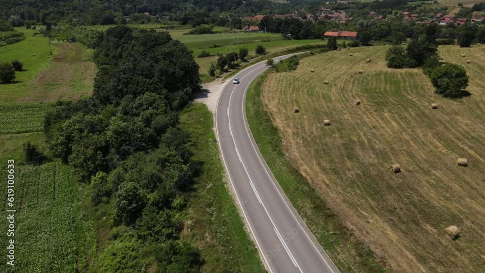 Aerial drone View of Cars Driving on Sunny summer Day on the road Aerial drone View of Cars Driving on Sunny summer Day on the road