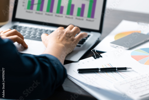 Business Data Analysis on Laptop: Financial Charts, Graphs, Reports for Successful Planning and Strategy. Professional Workplace: Analyzing Business Data, Charts, Graphs for Strategic Decision Making