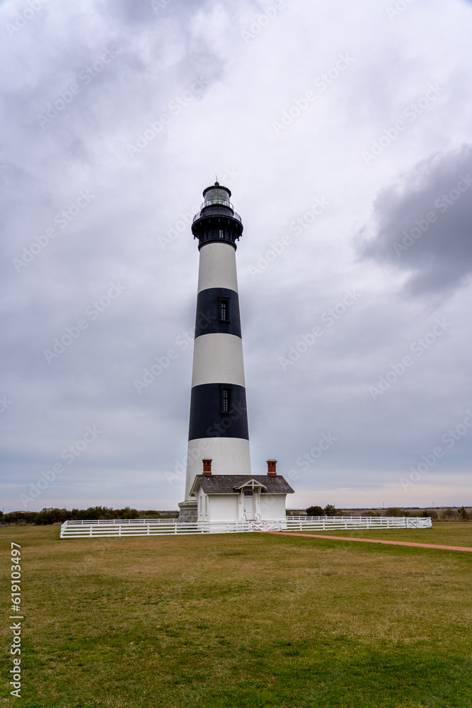 View of Black and White Stipped Color Lighthouse in the Outter Banks Island View of Black and White Stipped Color Lighthouse in the Outter Banks Island
