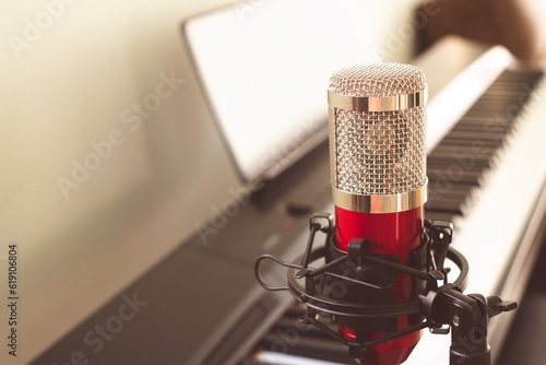 Obraz na płótnie Red condenser microphone at home studio for voice recording.