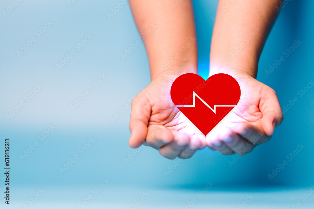 foster home concept. hands holding red heart, health care, love, organ donation, mindfulness, wellbeing, family insurance and CSR concept, world heart day, world health day, world mental health day. foster home concept. hands holding red heart, health care, love, organ donation, mindfulness, wellbeing, family insurance and CSR concept, world heart day, world health day, world mental health day.