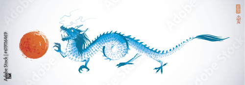 Ink wash painting with blue dragon and big red sun on white background. Traditional oriental ink painting sumi-e, u-sin, go-hua. Translation of hieroglyph - life energy
