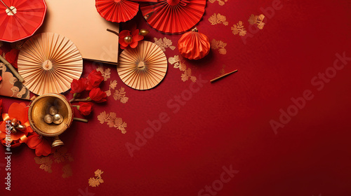 Chinese new year festival decorations made from chinese good luck symbol and plum blossom on a red background. Flat lay  top view with space