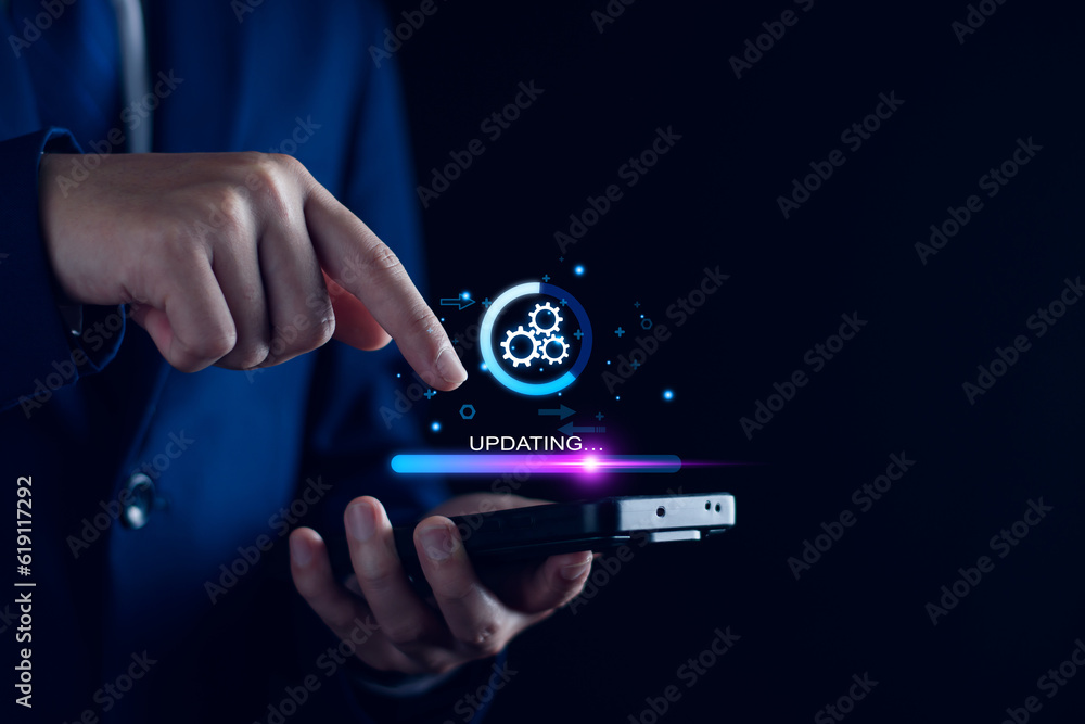 Operating system upgrade concept, installation app and software update process, modernize user equipment, update modern functions, developer released new version Improved security. User is downloading Operating system upgrade concept, installation app and software update process, modernize user equipment, update modern functions, developer released new version Improved security. User is downloading