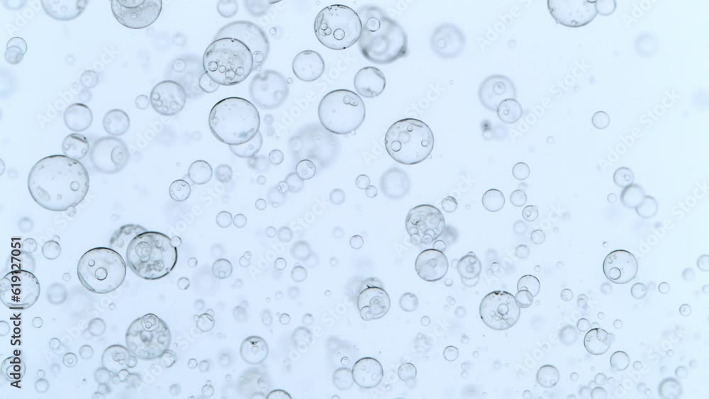 Super Slow Motion Shot of Moving Bubbles on White Background at 1000fps Super Slow Motion Shot of Moving Bubbles on White Background at 1000fps