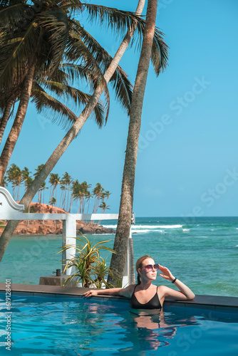 Travel. Retrit travel.Travelers woman coast ocean tropical island.wellness Solitude, wildlife,mental health,conscious travel,travel Travel sea banner,retreat, perspective, deserted beach