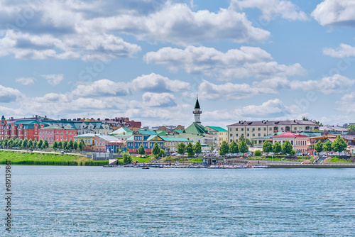 View of the Old Tatar Sloboda and the embankment from the Nizhny Kaban Lake, Kazan, Russia. photo