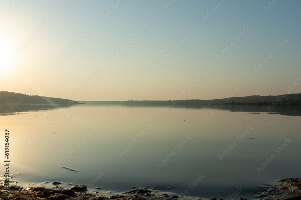 View of the panorama of a large lake early in the morning