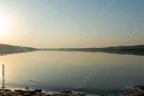 View of the panorama of a large lake early in the morning