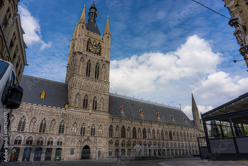 Fountains in the market square of Ypres on a beautiful sunny day. Tourist image for promotion of Ypres Belgium or Ieper België.  Capital of the westhoek belgium.  Lakenhalle, Belfort, Niewerck. photo