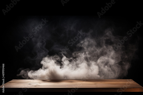 empty wooden table with smoke float up on dark background. High quality photo