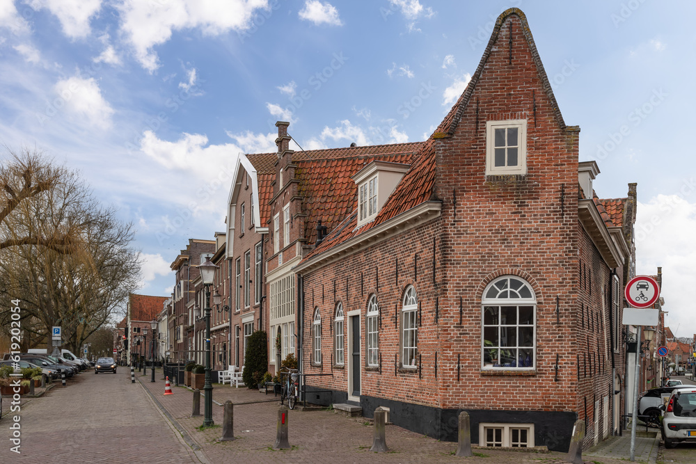 Street at the old harbor in the picturesque town of Enkhuizen.