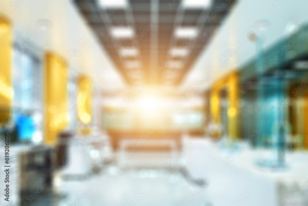 Fototapeta premium Blurred business background MODERN DEFOCUSED INTERIOR WITH CITY LIGHTS REFLECTIONS