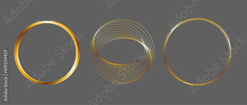 set of realistic abstract luxury gold shining ring on gray background. Vector light circles spotlight light effect. Gold color circular frame. Isolated design element 