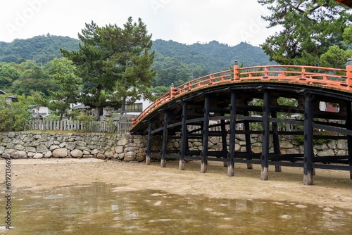 Vintage Japanese bridge sitting over dry river