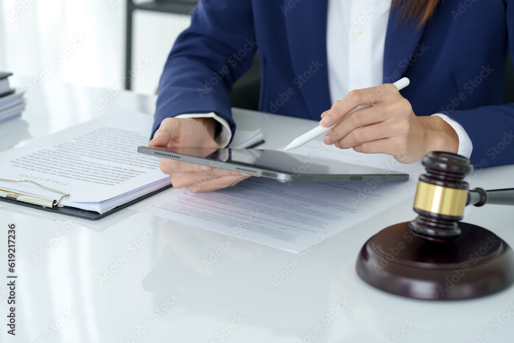 Lawyer working legal data contract at workplace.. Lawyer working legal data contract at workplace..