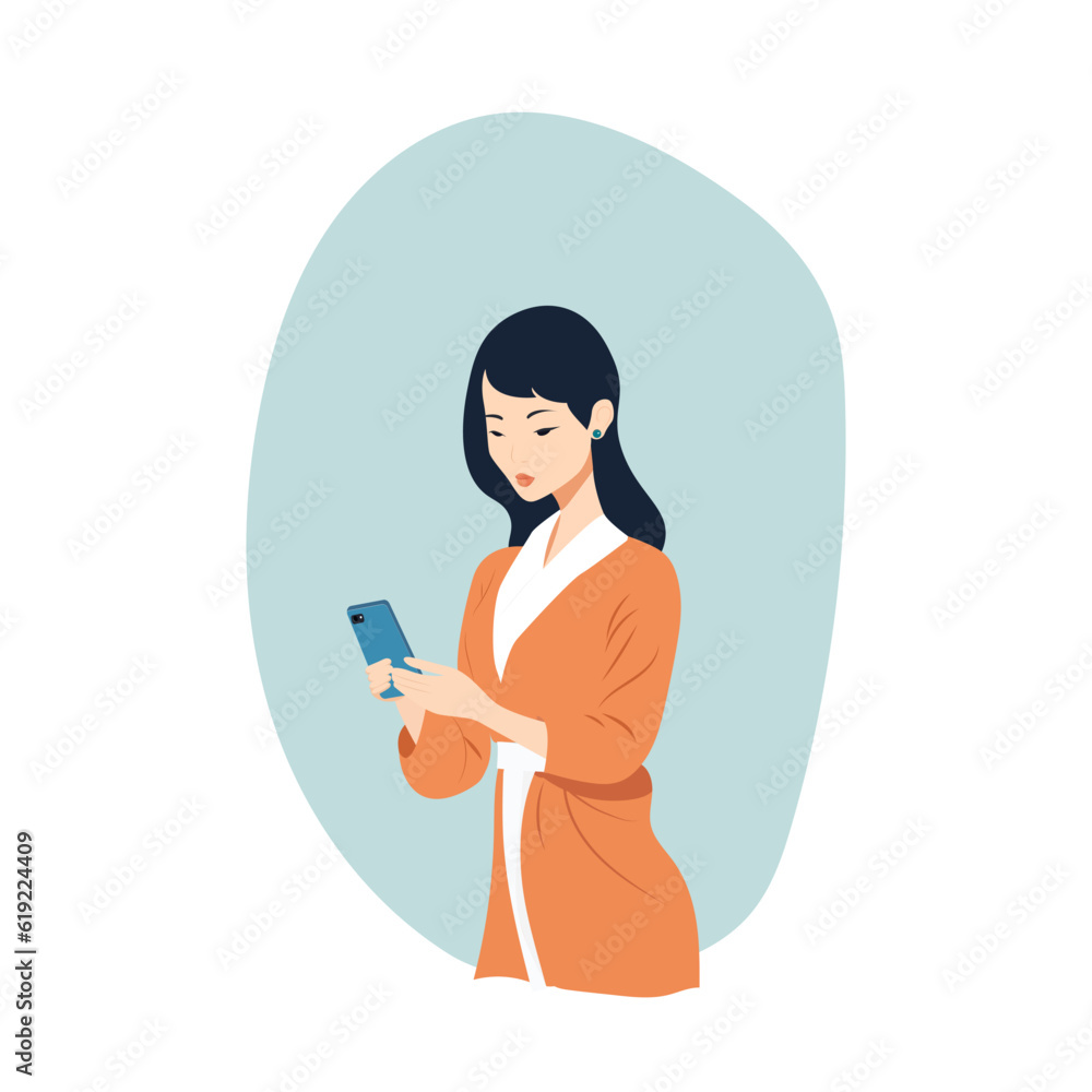Asian girl holds and watches the phone Asian girl holds and watches the phone