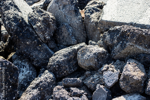 close up of a pile of dug up used tarmac 