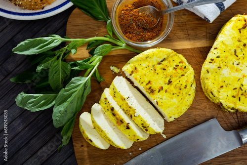 Keptas varskes suris su ciberzole. Cottage cheese with cumin on rustic table. Lithuanian dish photo