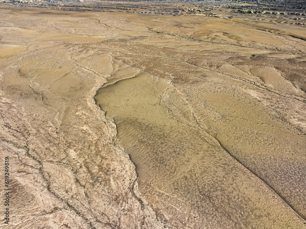 Looking down at the arid desert landscape - aerial view Looking down at the arid desert landscape - aerial view