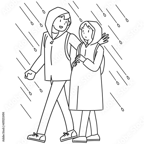 雨の中を避難する妊婦と支援する男性