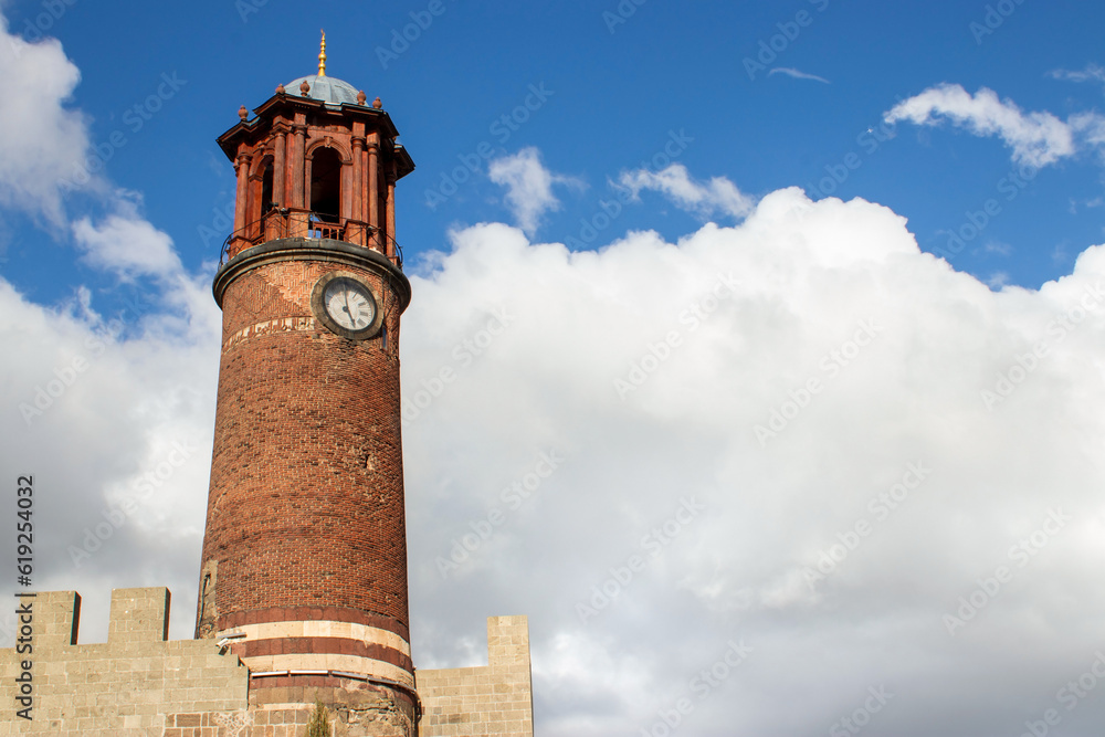 Clock Tower of Erzurum Castle with Traditional Red Tiled Architecture.copy space