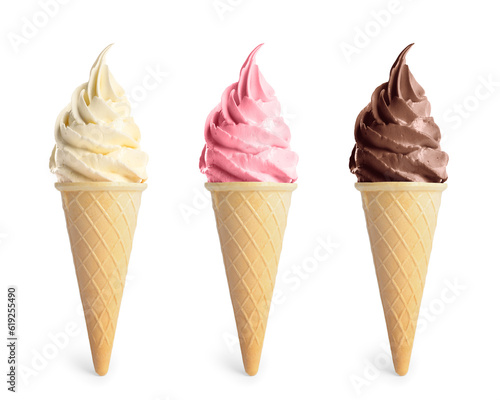 Leinwand Poster Set of different delicious soft serve ice creams in crispy cones on white backgr